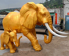 Fiberglass mother elephant and baby sculpture